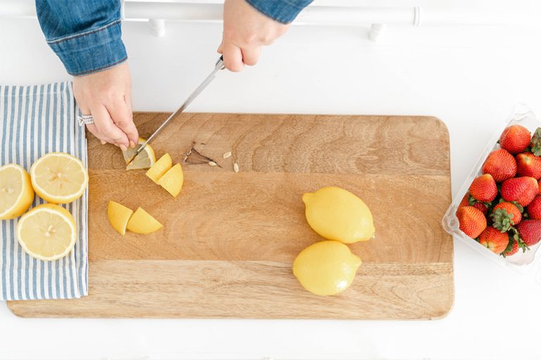 Slicing Lemons on Cutting Board