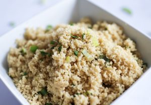 Herbed CousCous in white serving dish